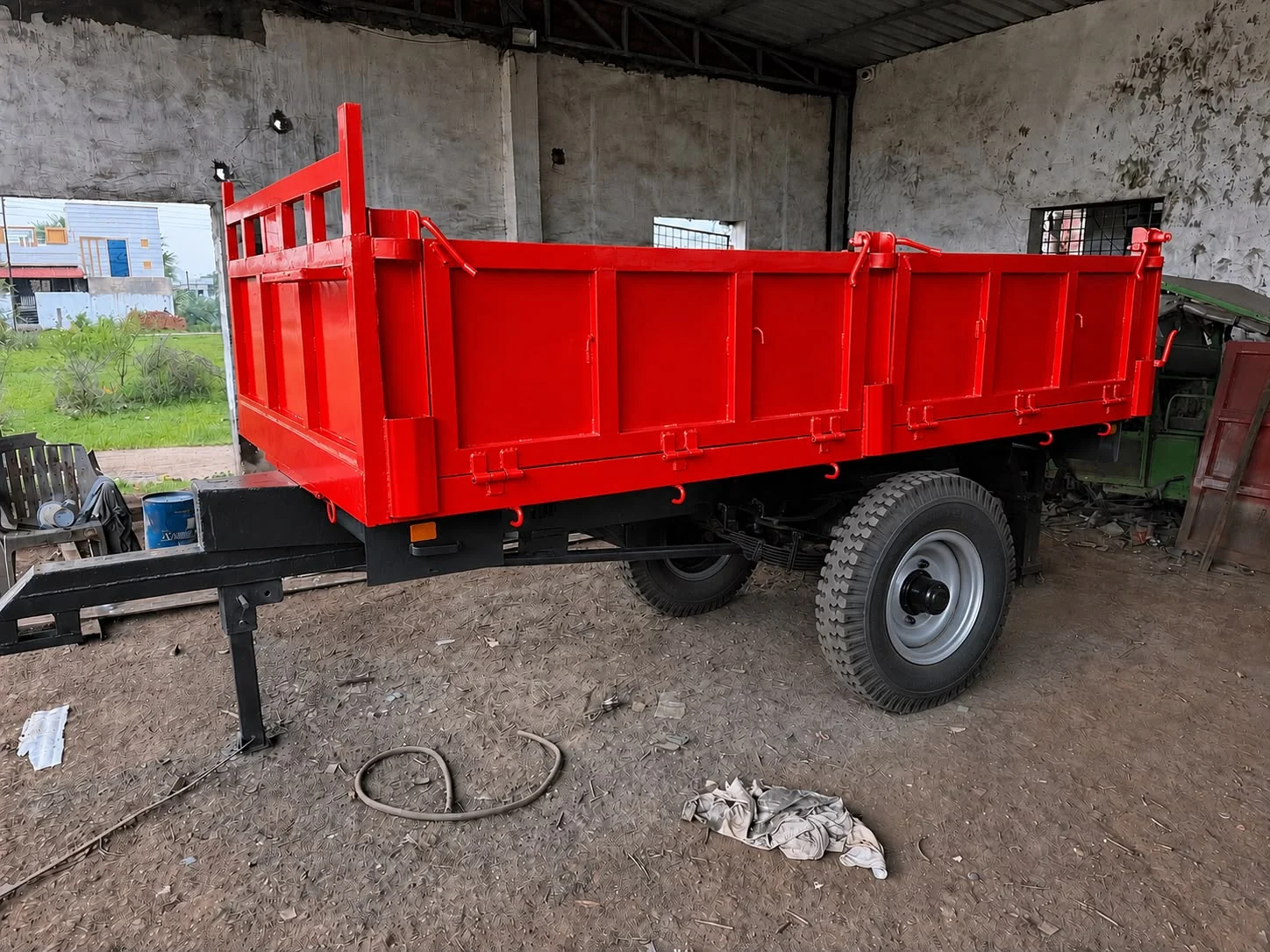 Red Vijay tractor trailer manufactured by Vijaylaxmi Engineering